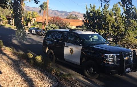 Sheriff cars at Adam Hill's house Hill claimes are there because of a protective order.