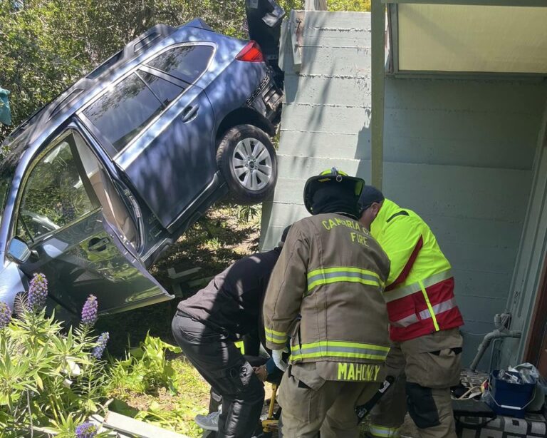 Firefighters rescue driver trapped in car in Cambria